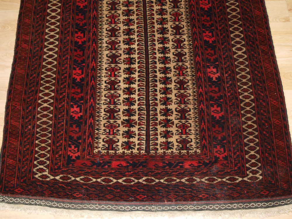 OLD BALUCH CAMEL GROUND PRAYER RUG WITH TREE OF LIFE, CIRCA 1920. View VII