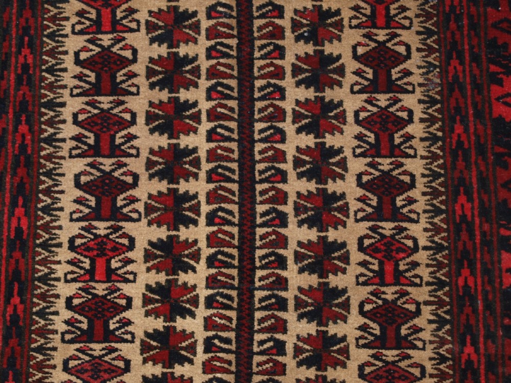 OLD BALUCH CAMEL GROUND PRAYER RUG WITH TREE OF LIFE, CIRCA 1920. View IX