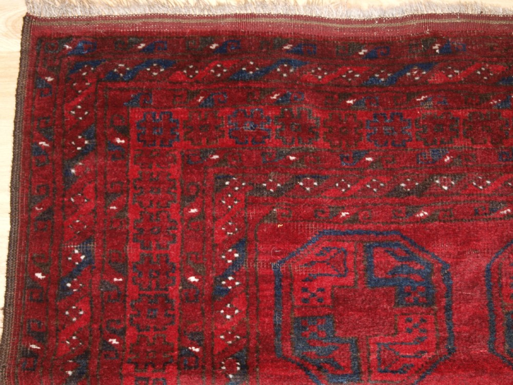 OLD AFGHAN VILLAGE RUG OF TRADITIONAL DESIGN, GOOD COLOUR, CIRCA 1920. View III