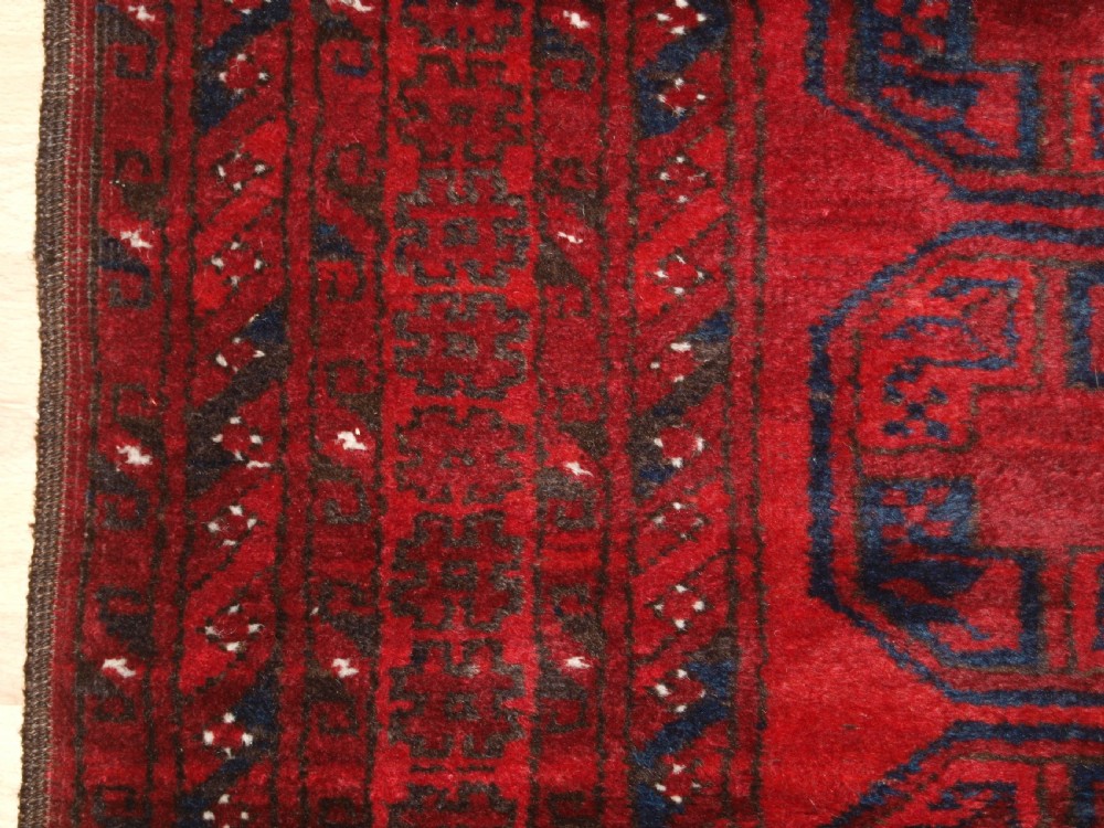 OLD AFGHAN VILLAGE RUG OF TRADITIONAL DESIGN, GOOD COLOUR, CIRCA 1920. View VII