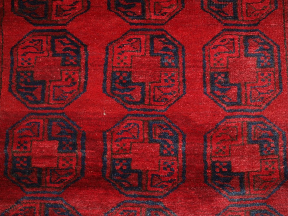 OLD AFGHAN VILLAGE RUG OF TRADITIONAL DESIGN, GOOD COLOUR, CIRCA 1920. View VIII