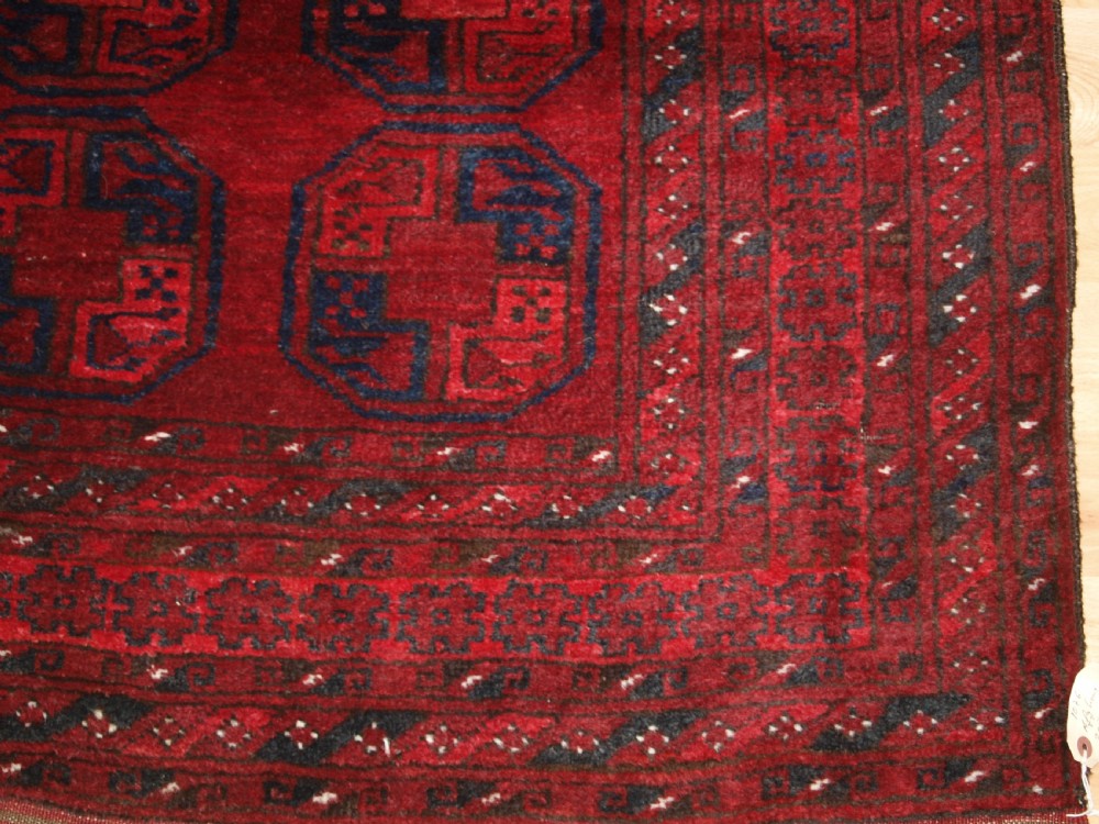 OLD AFGHAN VILLAGE RUG OF TRADITIONAL DESIGN, GOOD COLOUR, CIRCA 1920. View IX