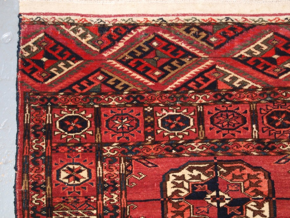 ANTIQUE TEKKE TURKMEN RUG, SOFT MADDER RED COLOUR, CIRCA 1900. View VI