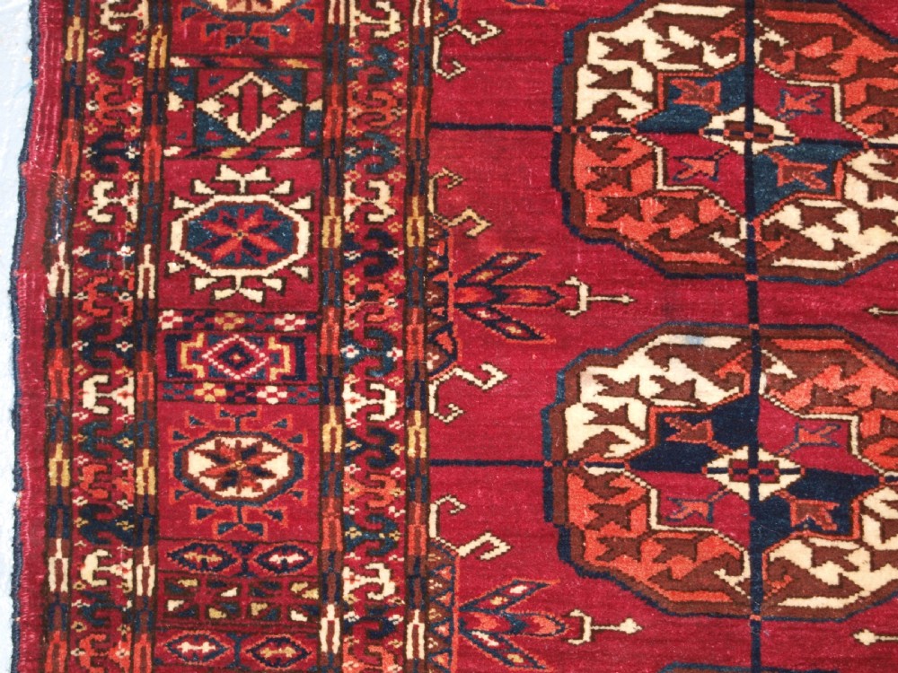 ANTIQUE TEKKE TURKMEN RUG, SOFT MADDER RED COLOUR, CIRCA 1900. View VII