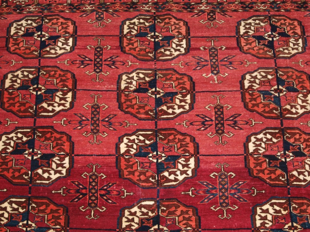 ANTIQUE TEKKE TURKMEN RUG, SOFT MADDER RED COLOUR, CIRCA 1900. View VIII