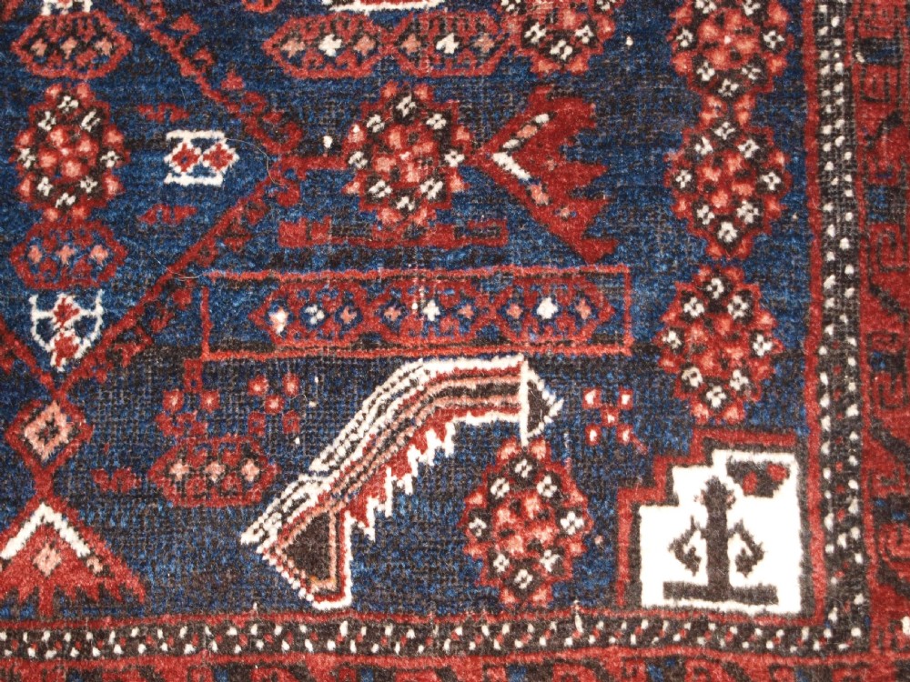 ANTIQUE BALUCH RUG, SALAR KHANI SUB TRIBE, HERATI DESIGN, CIRCA 1900. View X
