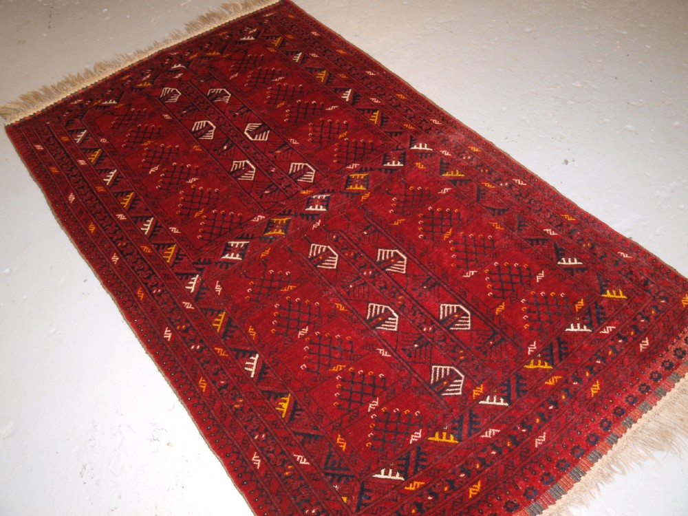 OLD AFGHAN RUG WITH ERSARI TURKMEN ENSI DESIGN, CIRCA 1920/30. View III