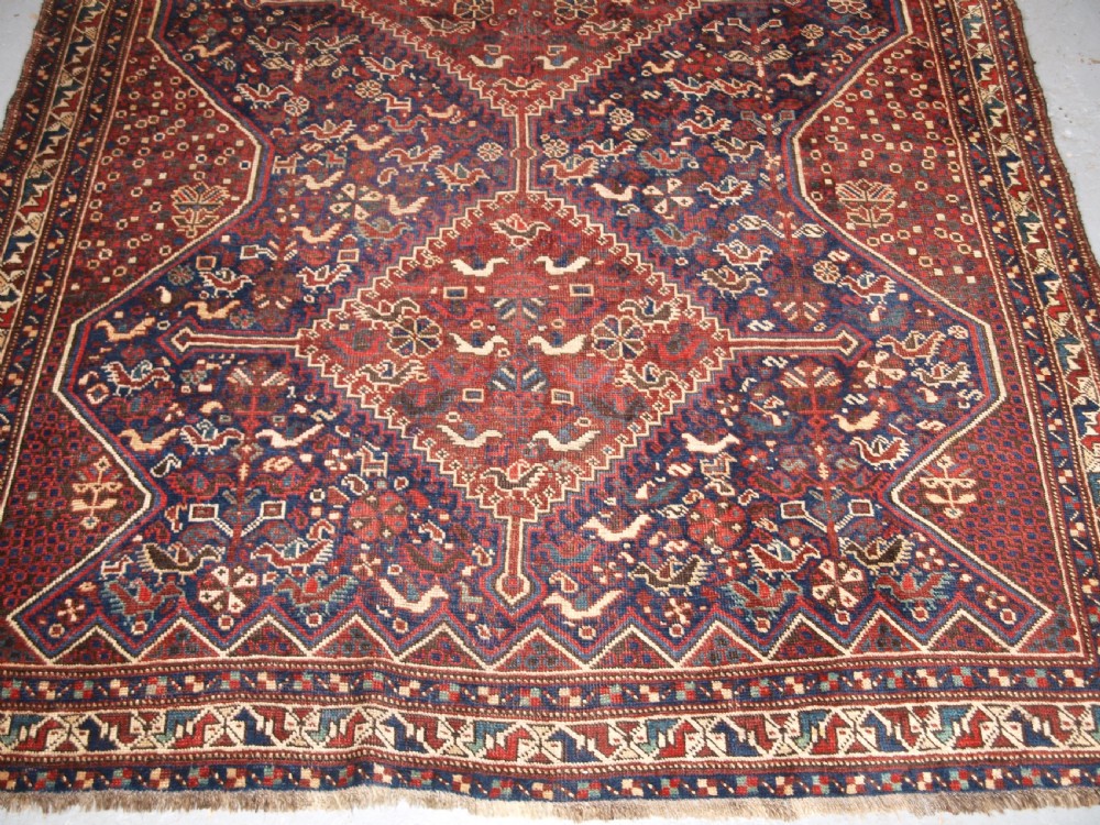 ANTIQUE KHAMSEH RUG WITH ALL OVER CHICKEN DESIGN, CIRCA 1900/20. View IV