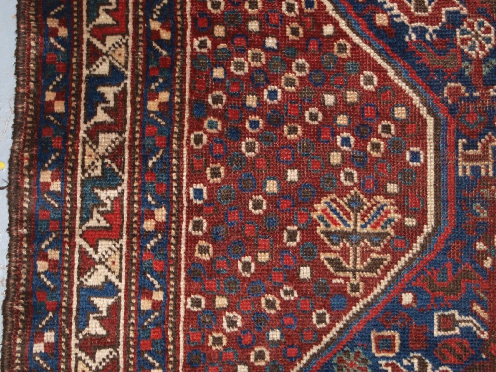 ANTIQUE KHAMSEH RUG WITH ALL OVER CHICKEN DESIGN, CIRCA 1900/20. View VI