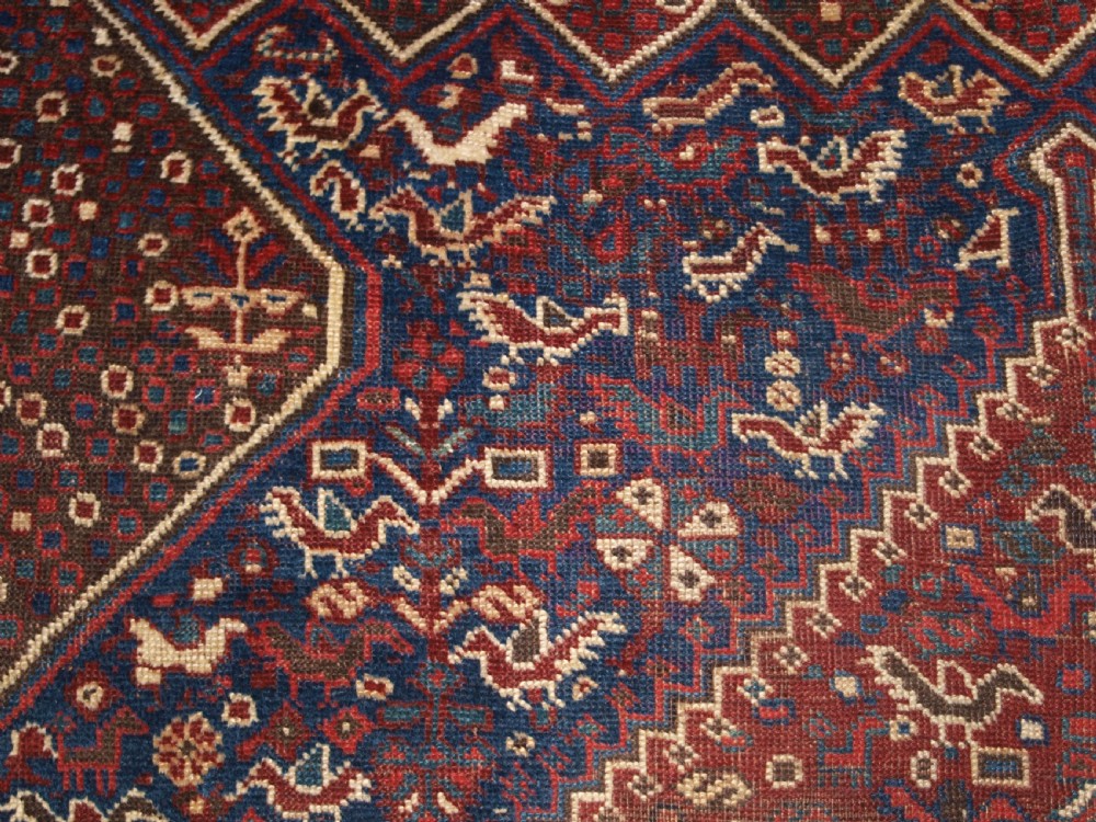 ANTIQUE KHAMSEH RUG WITH ALL OVER CHICKEN DESIGN, CIRCA 1900/20. View VII