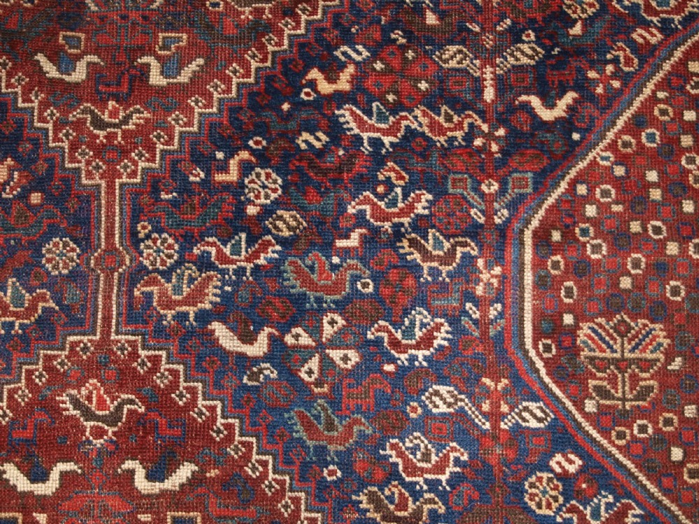 ANTIQUE KHAMSEH RUG WITH ALL OVER CHICKEN DESIGN, CIRCA 1900/20. View VIII