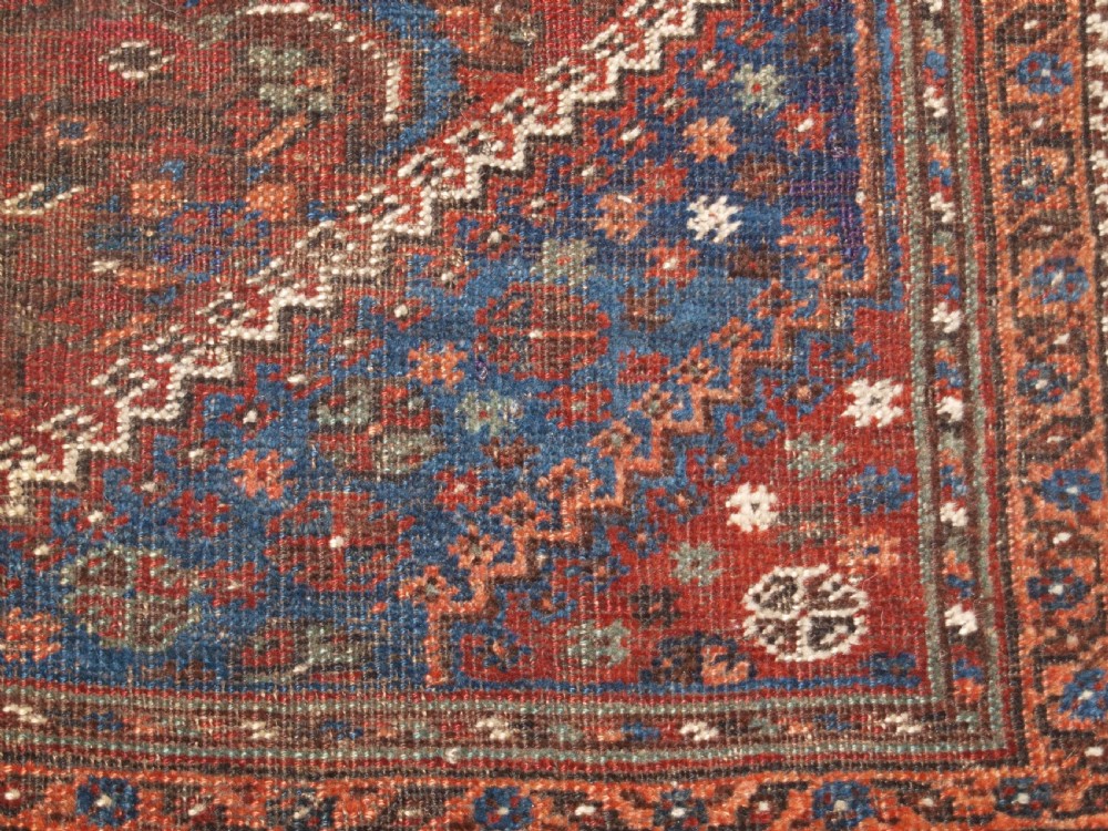 ANTIQUE KHAMSEH BAHARLU TRIBAL RUG, SINGLE MEDALLION, CIRCA 1900/20. View VIII