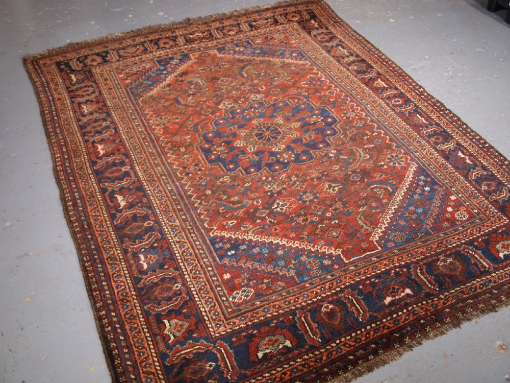 ANTIQUE KHAMSEH BAHARLU TRIBAL RUG, SINGLE MEDALLION, CIRCA 1900/20. View XIII