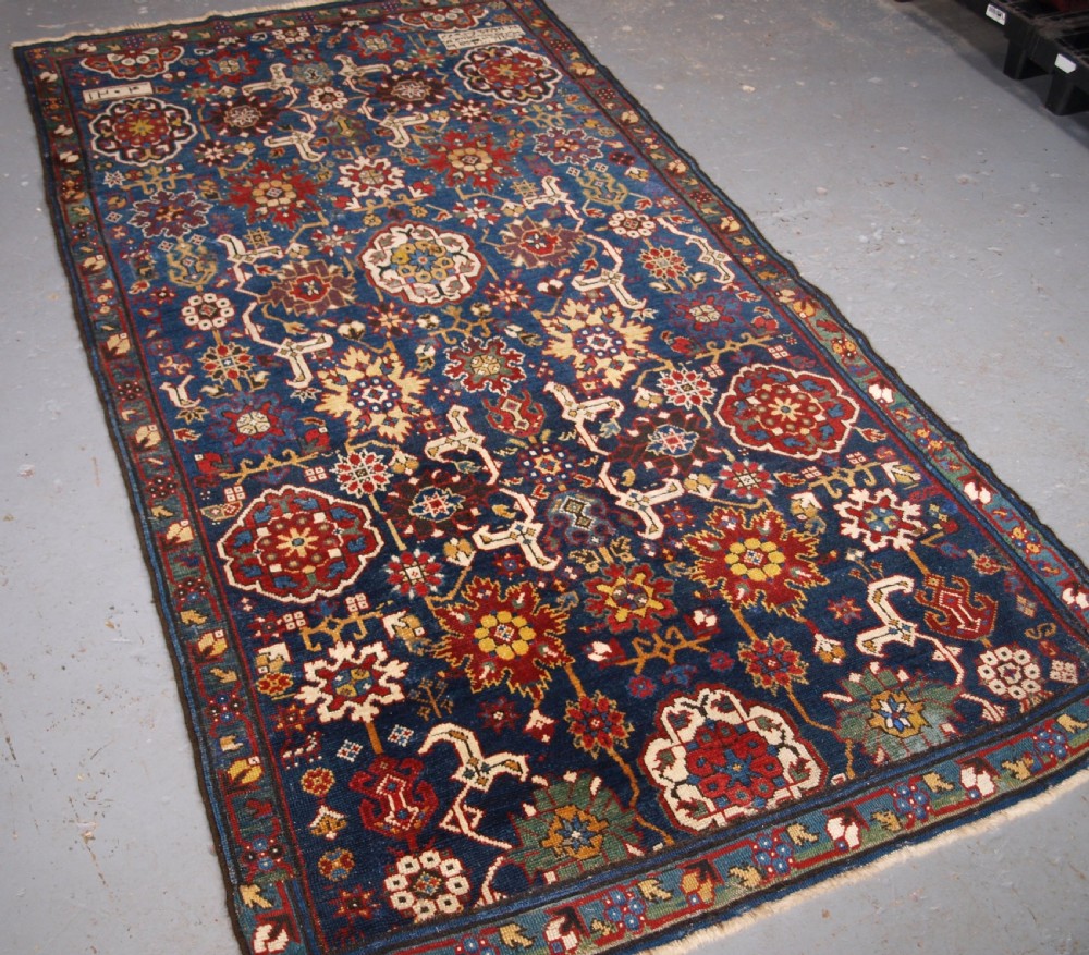 ANTIQUE CAUCASIAN KUBA RUG FRAGMENT, AFSHAN DESIGN, DATED AND INSCRIBED, 19TH CENTURY.