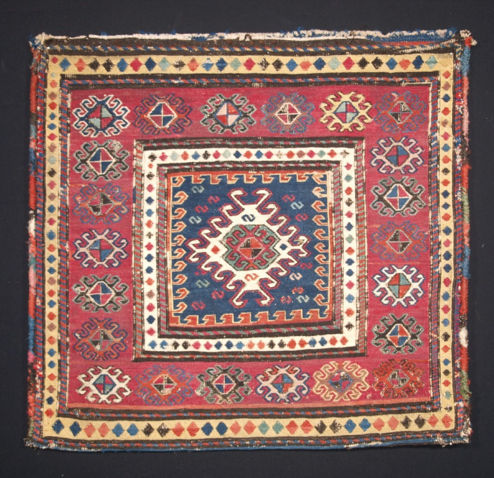 ANTIQUE SOUTH CAUCASIAN KHORJIN SADDLEBAG IN SOUMAK WEAVE, CIRCA 1900. A.