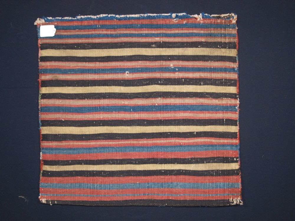 ANTIQUE SOUTH CAUCASIAN KHORJIN SADDLEBAG IN SOUMAK WEAVE, CIRCA 1900. A. View VIII