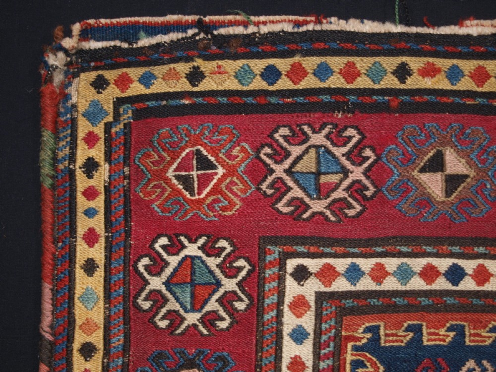 ANTIQUE SOUTH CAUCASIAN KHORJIN SADDLEBAG IN SOUMAK WEAVE, CIRCA 1900. B View II