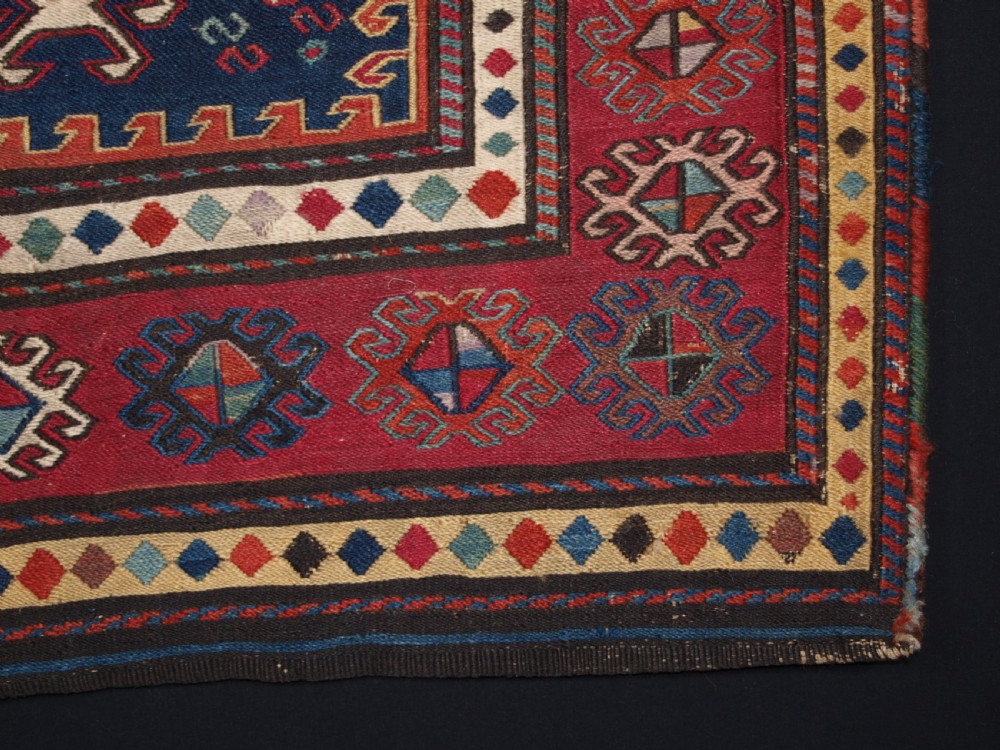 ANTIQUE SOUTH CAUCASIAN KHORJIN SADDLEBAG IN SOUMAK WEAVE, CIRCA 1900. B View IV