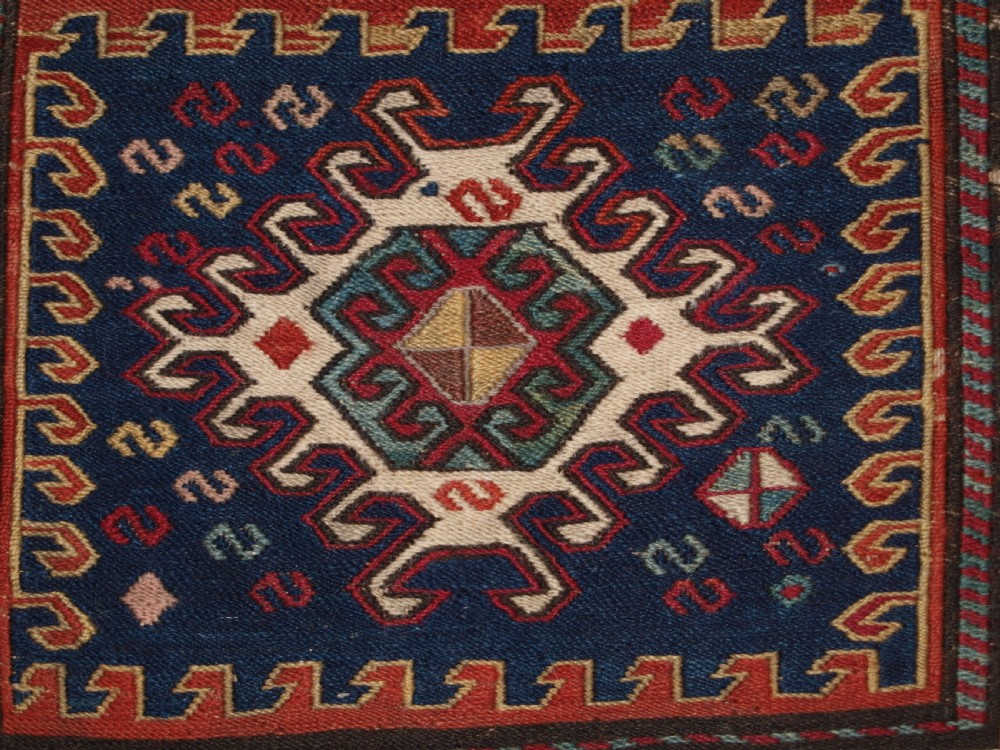 ANTIQUE SOUTH CAUCASIAN KHORJIN SADDLEBAG IN SOUMAK WEAVE, CIRCA 1900. B View VI