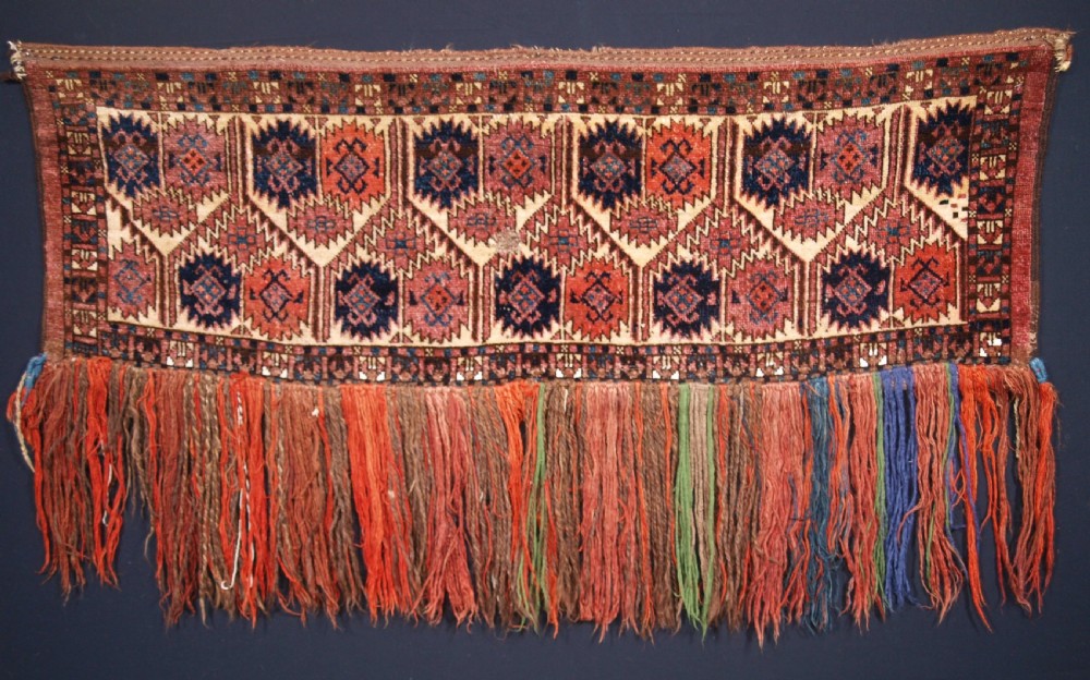 ANTIQUE ERSARI TURKMEN TORBA WITH UNUSUAL DESIGN, IVORY GROUND, CIRCA 1900.
