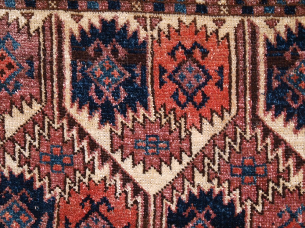 ANTIQUE ERSARI TURKMEN TORBA WITH UNUSUAL DESIGN, IVORY GROUND, CIRCA 1900. View VII