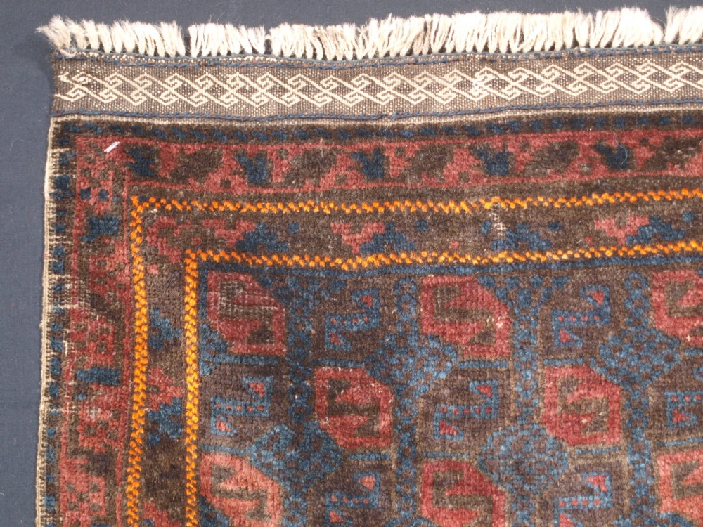 ANTIQUE BALUCH BAG FACE WITH TILE DESIGN, CIRCA 1900. View II