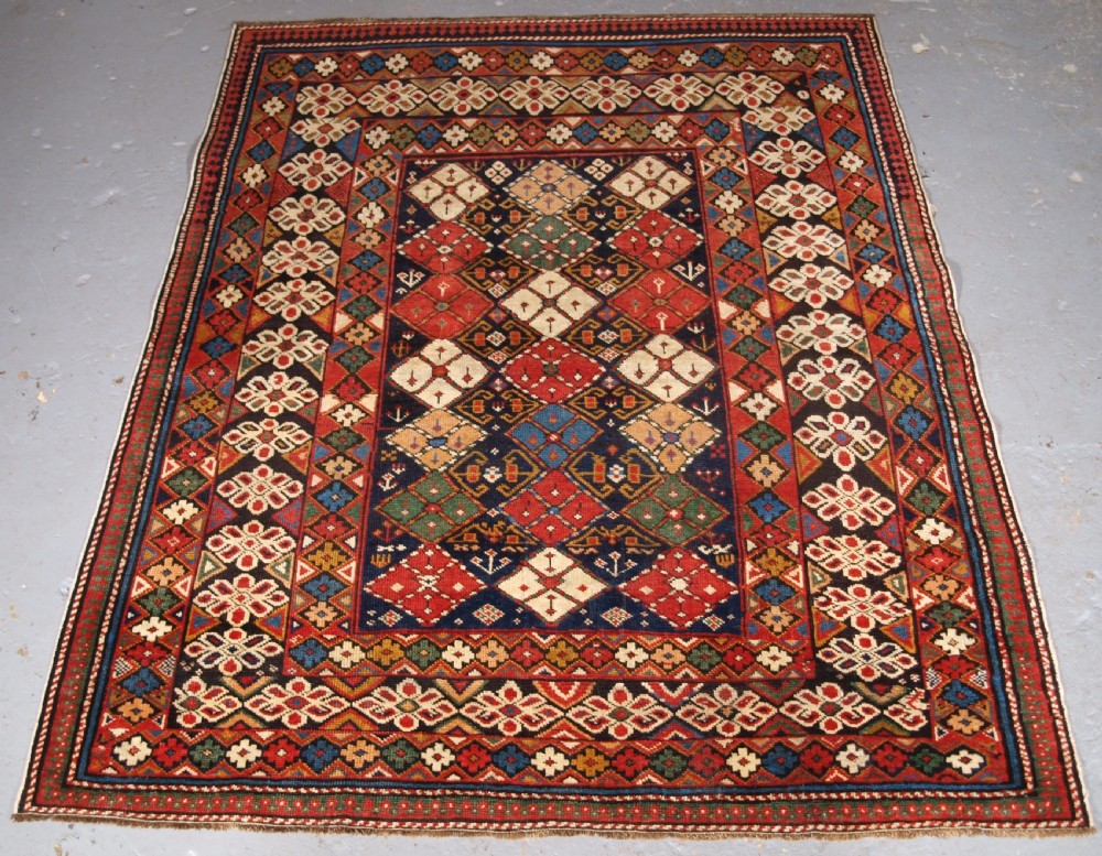 ANTIQUE CAUCASIAN RUG KUBA REGION, SCARCE CHICHI DESIGN, CIRCA 1890.