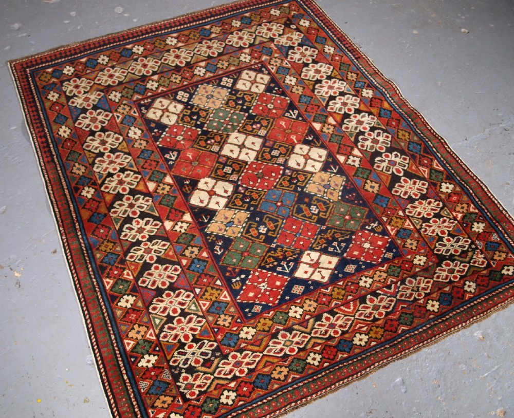 ANTIQUE CAUCASIAN RUG KUBA REGION, SCARCE CHICHI DESIGN, CIRCA 1890. View II