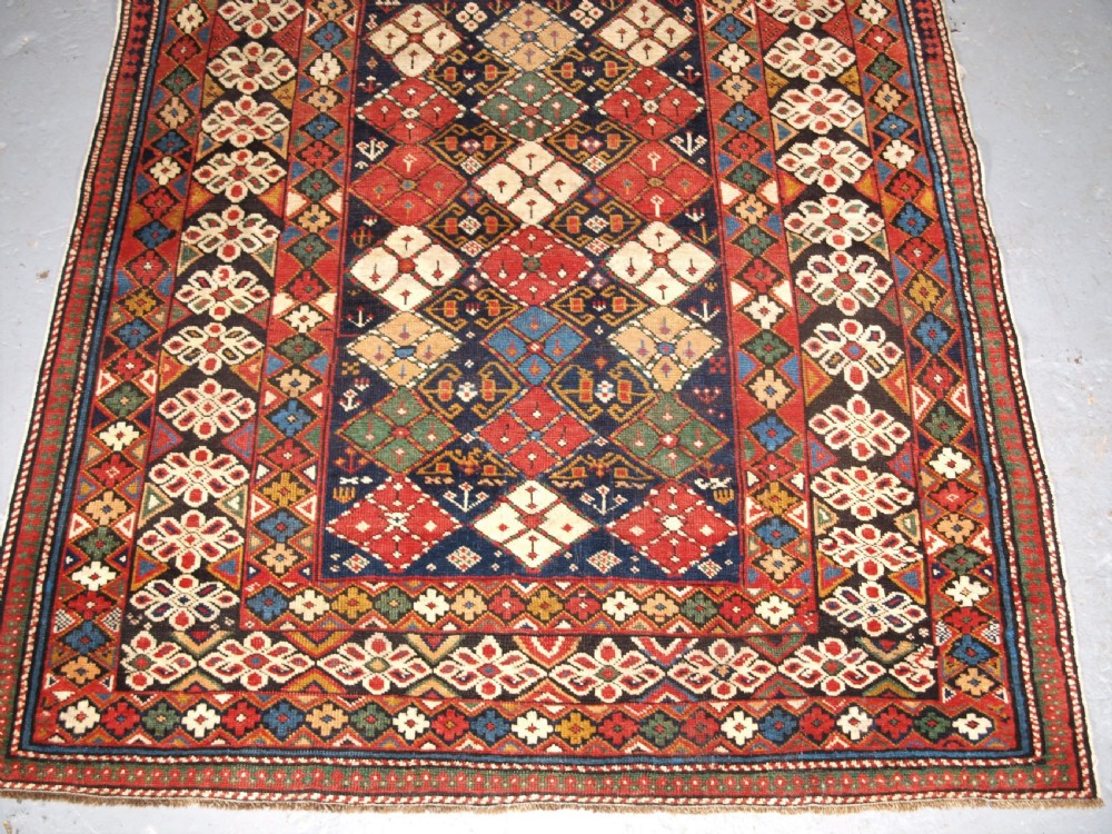 ANTIQUE CAUCASIAN RUG KUBA REGION, SCARCE CHICHI DESIGN, CIRCA 1890. View V
