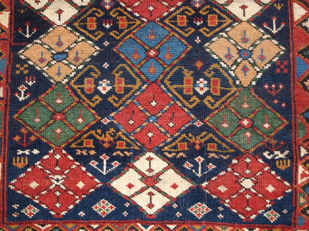 ANTIQUE CAUCASIAN RUG KUBA REGION, SCARCE CHICHI DESIGN, CIRCA 1890. View VIII