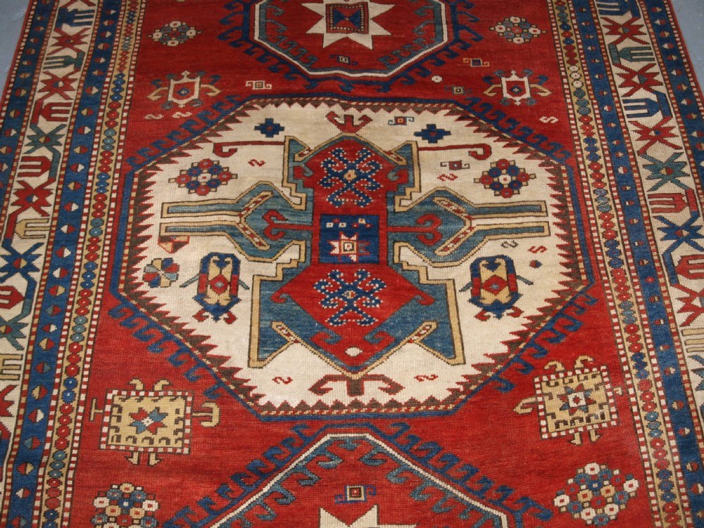 ANTIQUE CAUCASIAN LORI PAMBAK KAZAK RUG, OUTSTANDING COLOUR, CIRCA 1880. View IV