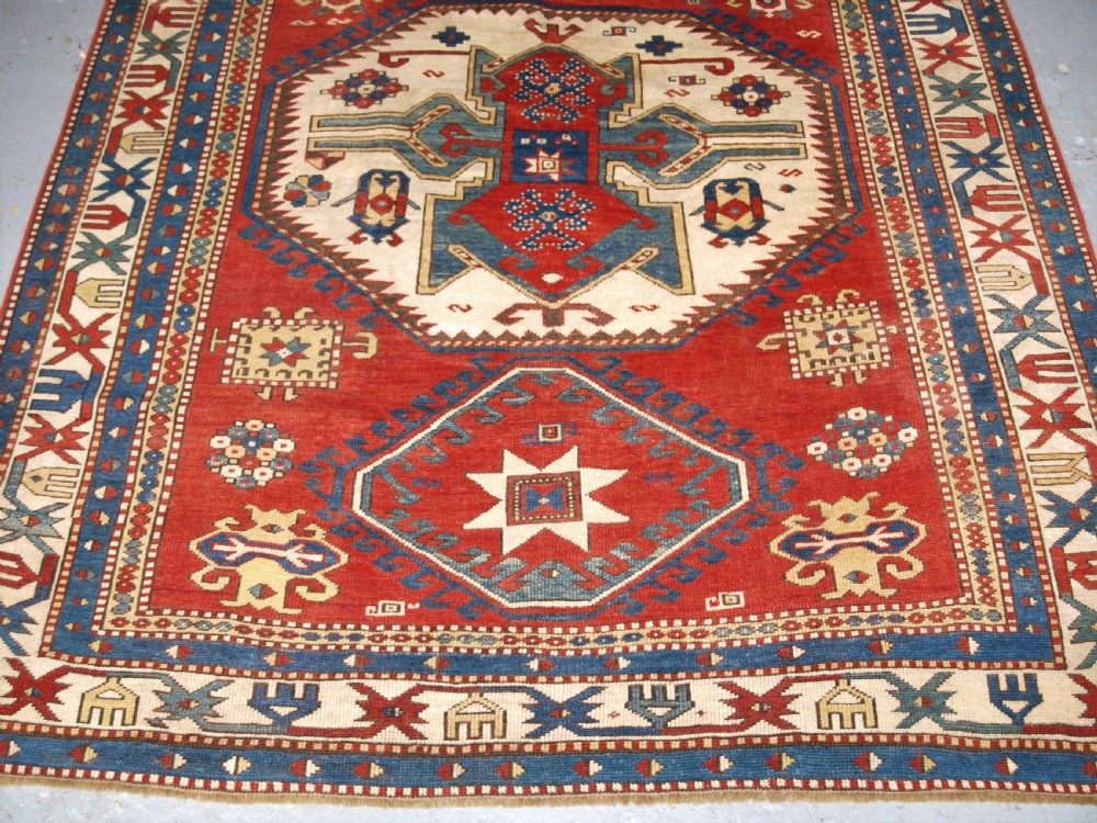 ANTIQUE CAUCASIAN LORI PAMBAK KAZAK RUG, OUTSTANDING COLOUR, CIRCA 1880. View V