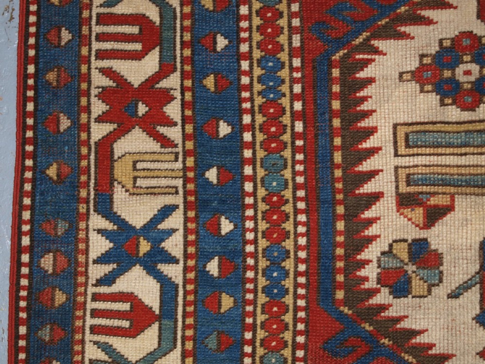 ANTIQUE CAUCASIAN LORI PAMBAK KAZAK RUG, OUTSTANDING COLOUR, CIRCA 1880. View VII