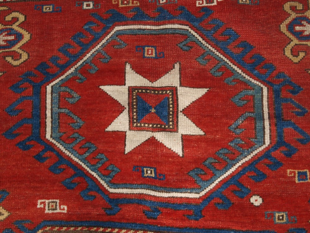 ANTIQUE CAUCASIAN LORI PAMBAK KAZAK RUG, OUTSTANDING COLOUR, CIRCA 1880. View X