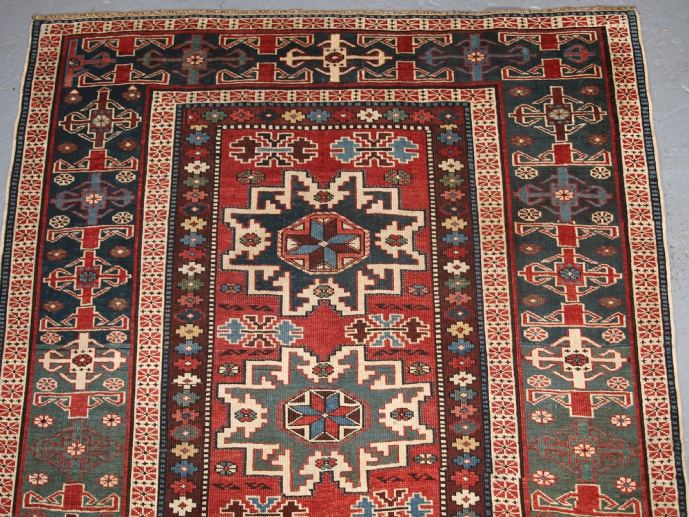 ANTIQUE EAST CAUCASIAN RUG WITH LESGHI STAR DESIGN, CIRCA 1890. View III