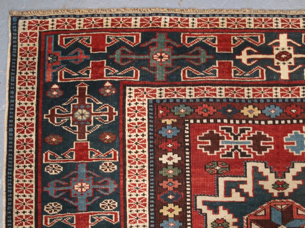 ANTIQUE EAST CAUCASIAN RUG WITH LESGHI STAR DESIGN, CIRCA 1890. View V