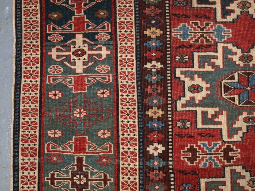 ANTIQUE EAST CAUCASIAN RUG WITH LESGHI STAR DESIGN, CIRCA 1890. View VI