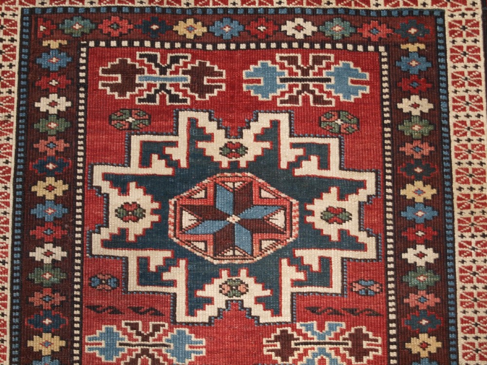 ANTIQUE EAST CAUCASIAN RUG WITH LESGHI STAR DESIGN, CIRCA 1890. View VII