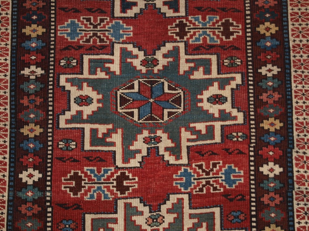 ANTIQUE EAST CAUCASIAN RUG WITH LESGHI STAR DESIGN, CIRCA 1890. View VIII
