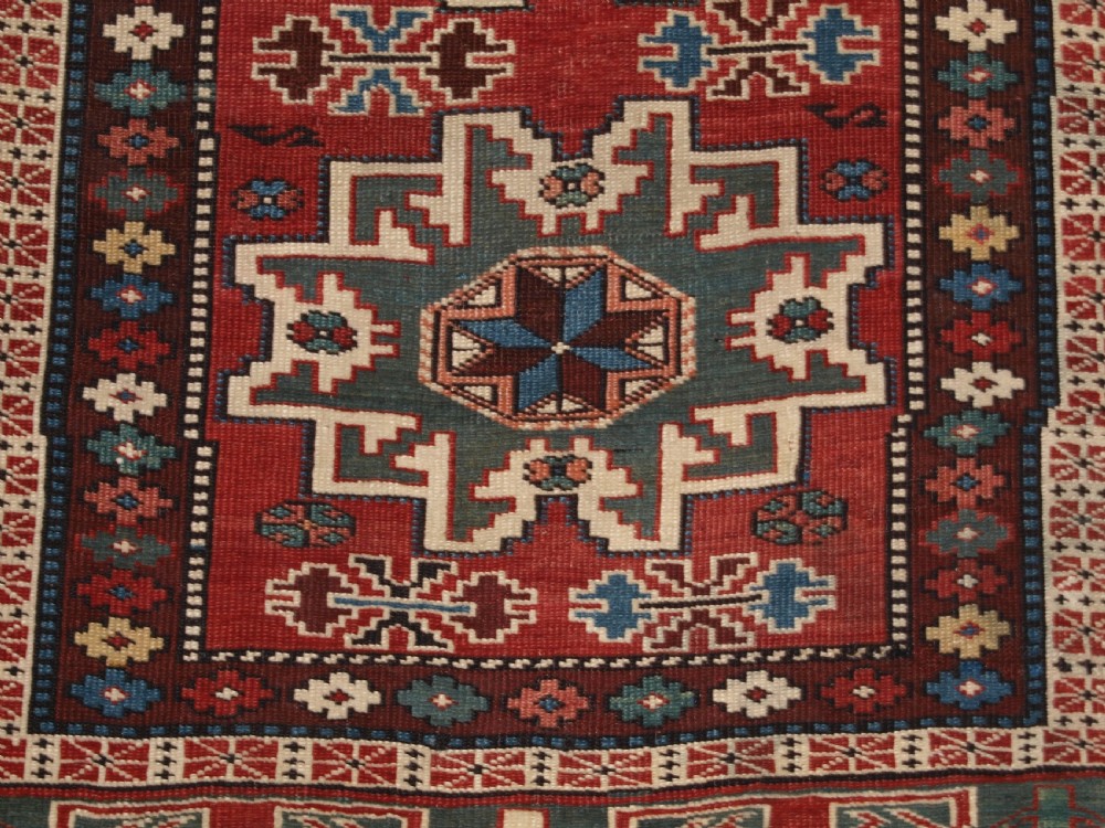 ANTIQUE EAST CAUCASIAN RUG WITH LESGHI STAR DESIGN, CIRCA 1890. View IX