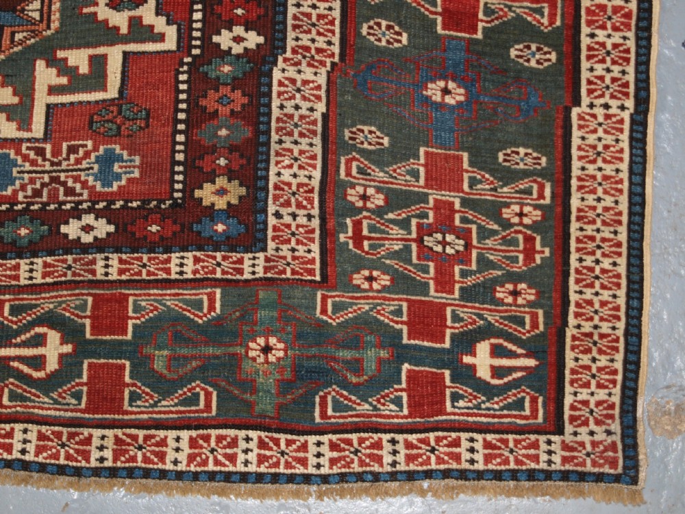ANTIQUE EAST CAUCASIAN RUG WITH LESGHI STAR DESIGN, CIRCA 1890. View X