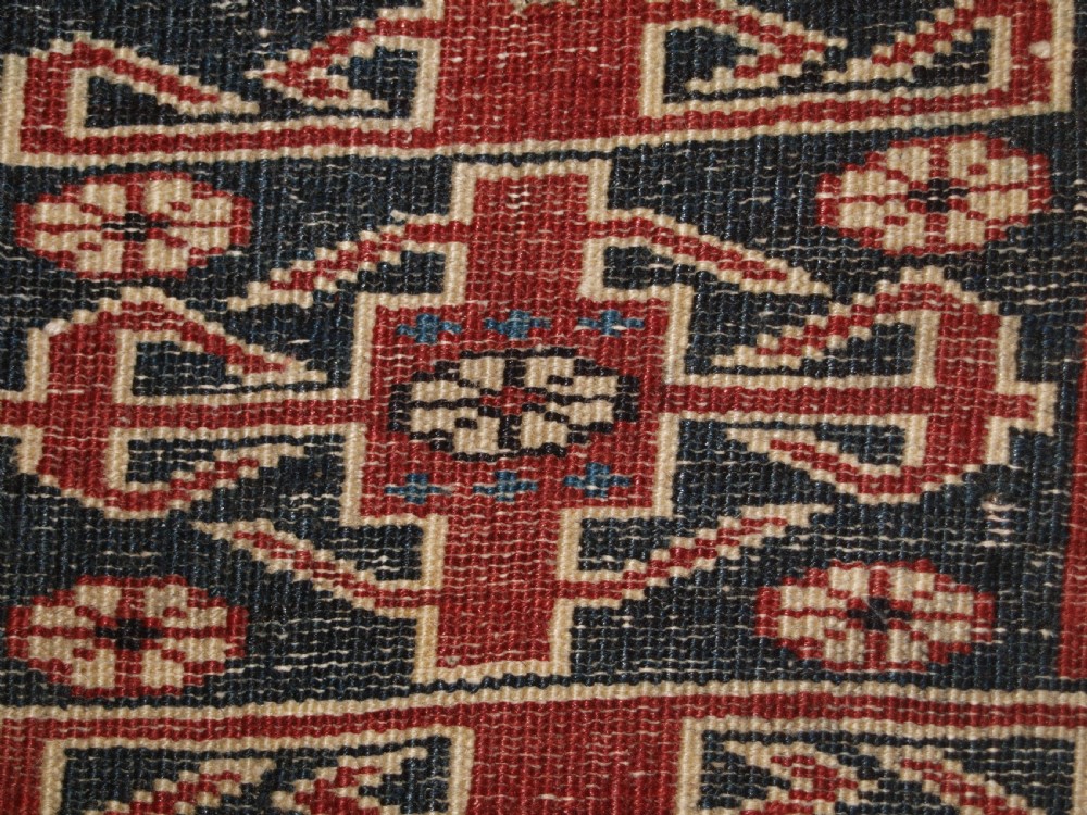 ANTIQUE EAST CAUCASIAN RUG WITH LESGHI STAR DESIGN, CIRCA 1890. View XI