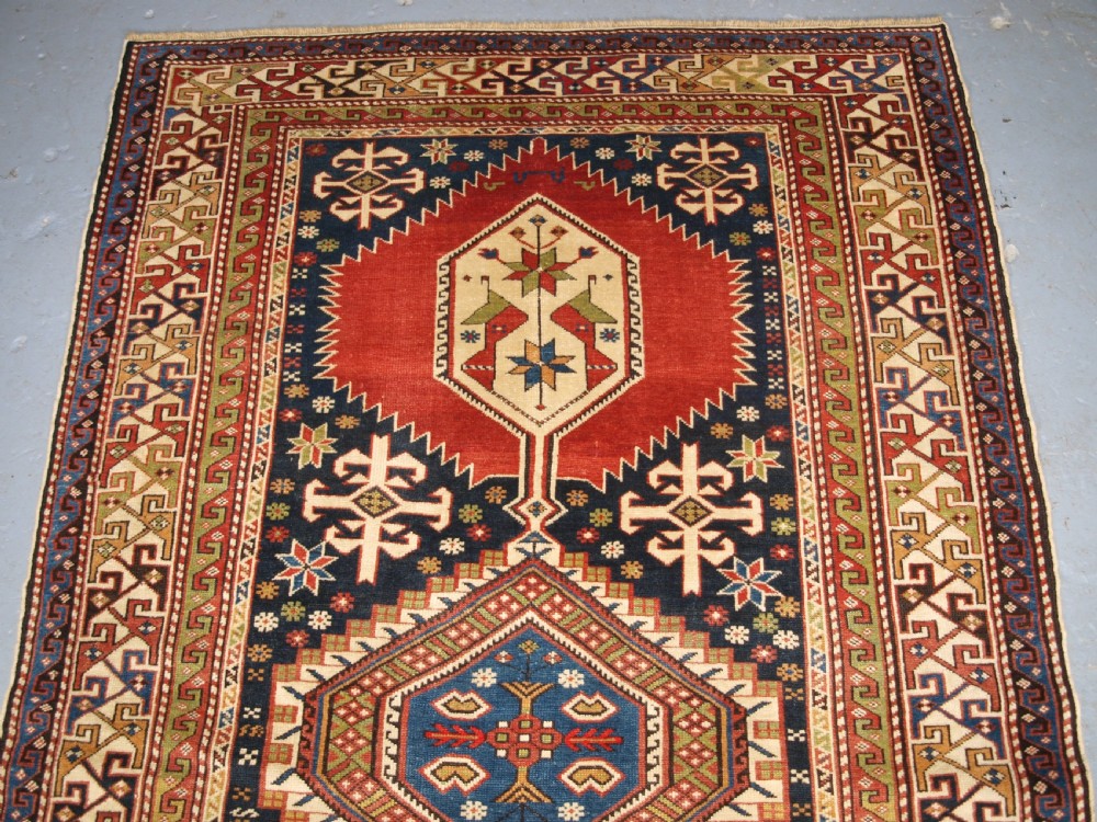 ANTIQUE CAUCASIAN RUG, SHIRVAN MEDALLION DESIGN, CIRCA 1890. View III