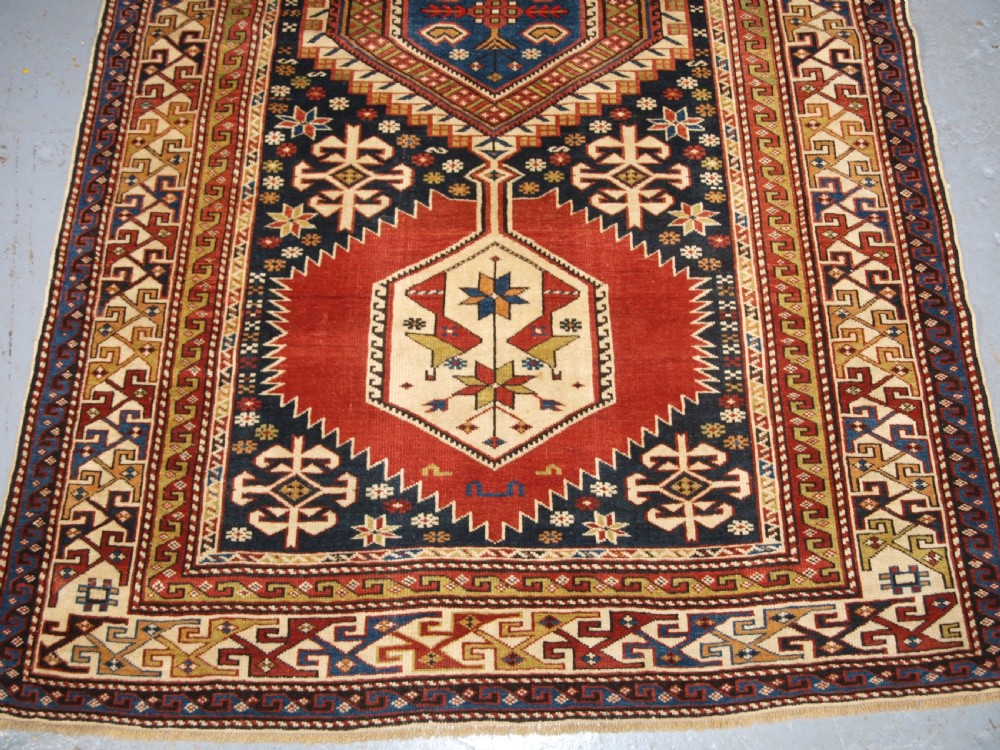 ANTIQUE CAUCASIAN RUG, SHIRVAN MEDALLION DESIGN, CIRCA 1890. View V