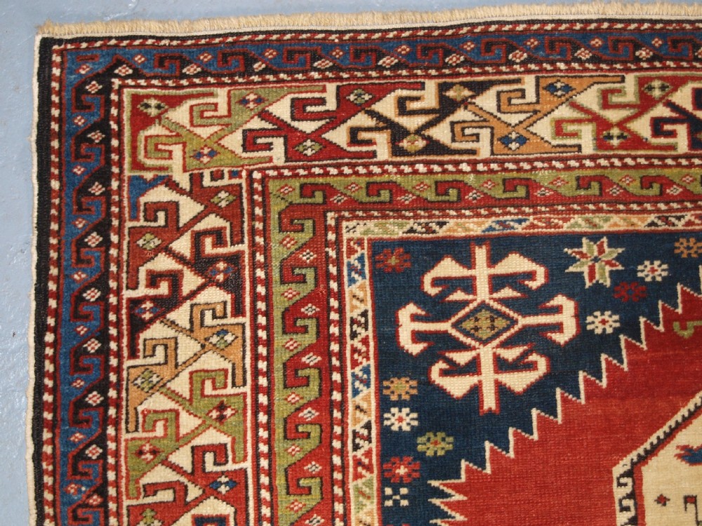 ANTIQUE CAUCASIAN RUG, SHIRVAN MEDALLION DESIGN, CIRCA 1890. View VI