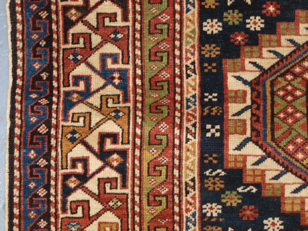 ANTIQUE CAUCASIAN RUG, SHIRVAN MEDALLION DESIGN, CIRCA 1890. View VII