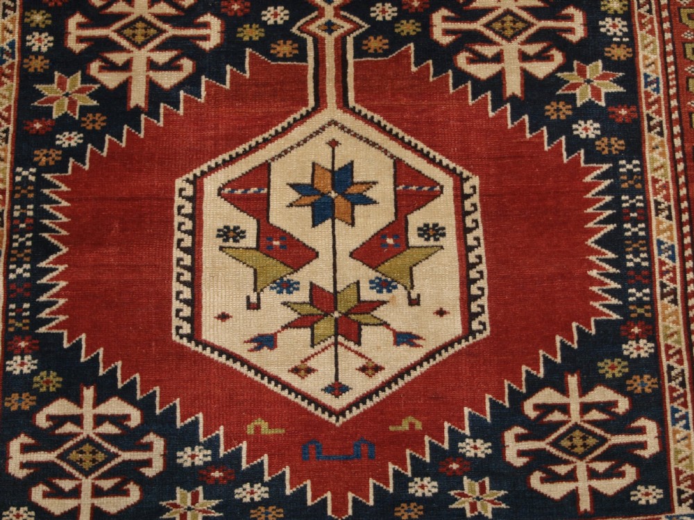 ANTIQUE CAUCASIAN RUG, SHIRVAN MEDALLION DESIGN, CIRCA 1890. View X
