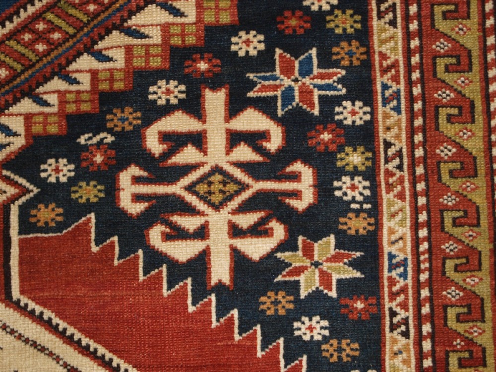 ANTIQUE CAUCASIAN RUG, SHIRVAN MEDALLION DESIGN, CIRCA 1890. View XI