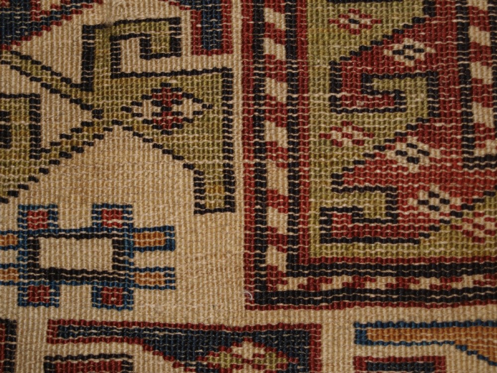 ANTIQUE CAUCASIAN RUG, SHIRVAN MEDALLION DESIGN, CIRCA 1890. View XII
