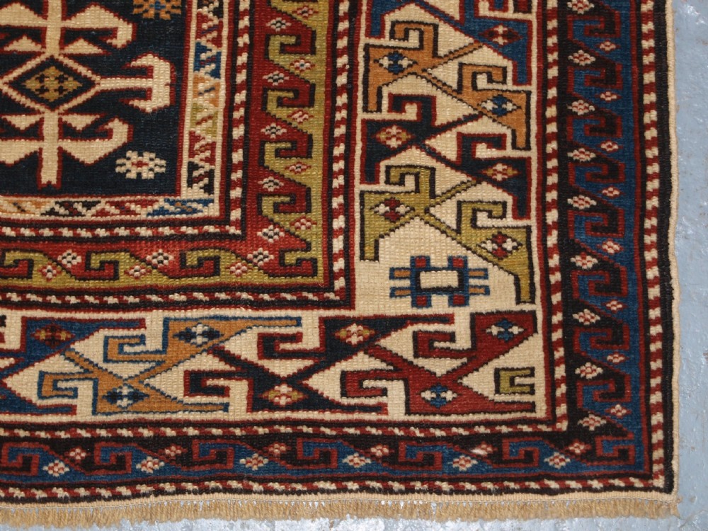 ANTIQUE CAUCASIAN RUG, SHIRVAN MEDALLION DESIGN, CIRCA 1890. View XIII
